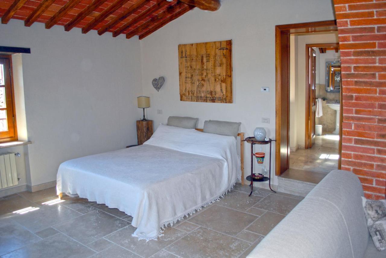 Borgo San Gusme Apartment Bagian luar foto