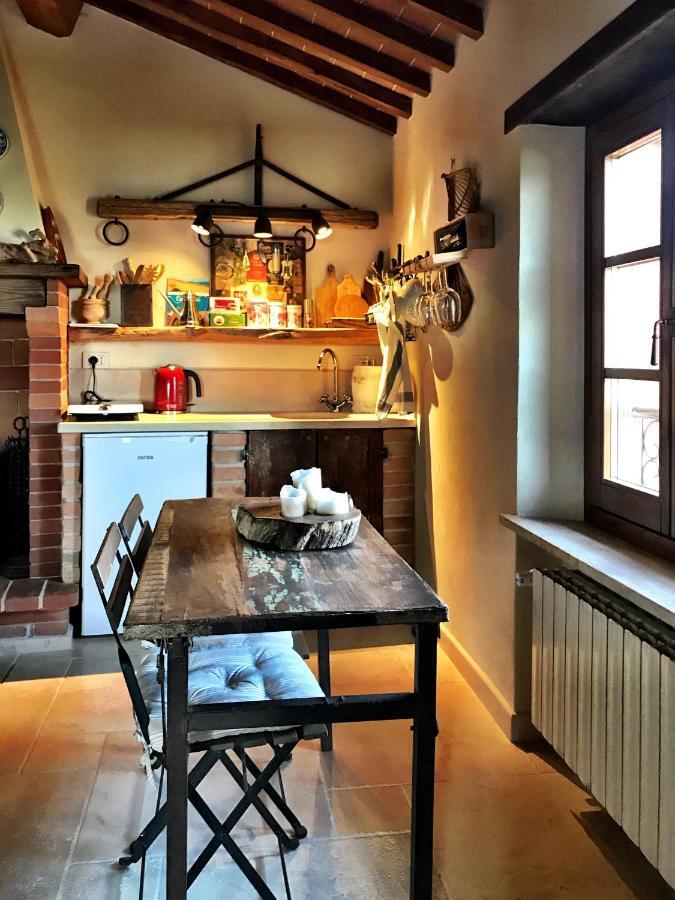 Borgo San Gusme Apartment Bagian luar foto